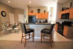 Fully equipped kitchen with breakfast nook area